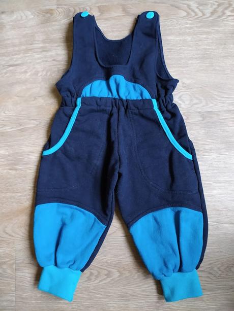 Tepláčky s laclem, 74