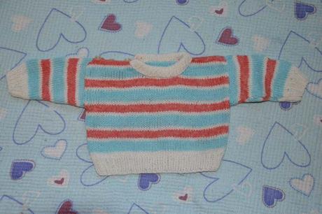 Proužkatý svetřík, 62