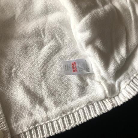 Bílý svetřík s podšívkou, 62