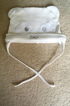 Ušatá čepička, 74