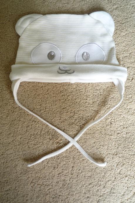 Ušatá čepička, 74