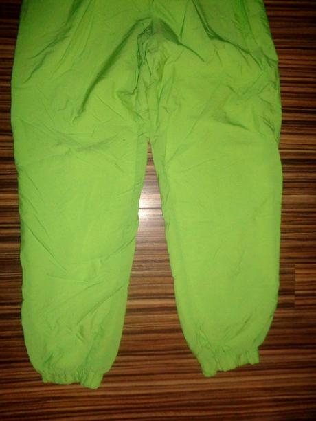 Svítivě zelené šusťákové kalhoty-podšité bavlnou, xl