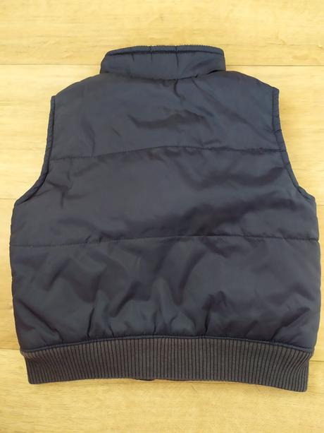 Teplá černá vesta, 86