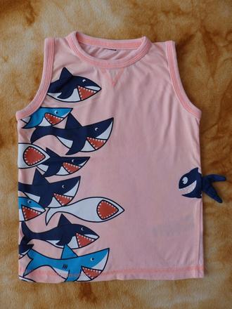 Tílko se žraloky, 98