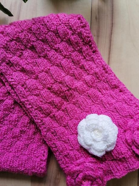 Šála s květy, 104