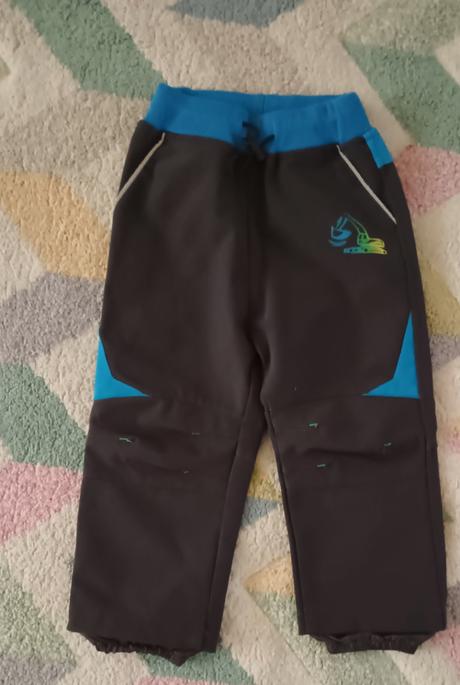 Jarní softshellové kalhoty s bagrem vel.86, kugo,86