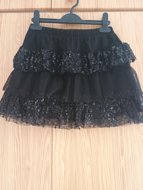 Sukně s flitry, 134