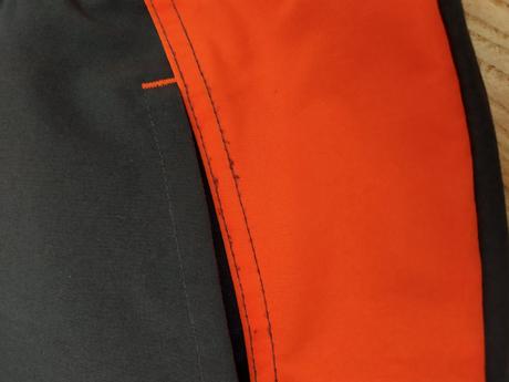 Šedo oranžová bunda, decathlon,134