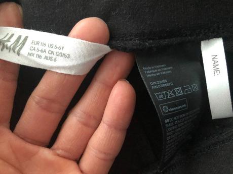 Černé úzké elastické kalhoty 116cm holka zipy 5-6l, h&m,116