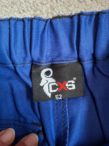 Dvoje bavlněné pracovní kalhoty, xl