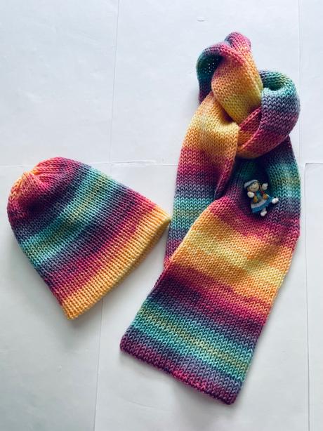 Čepice se šálou, 128