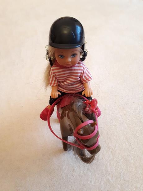 Panenka evička, žokejka na koni, zn.simba,