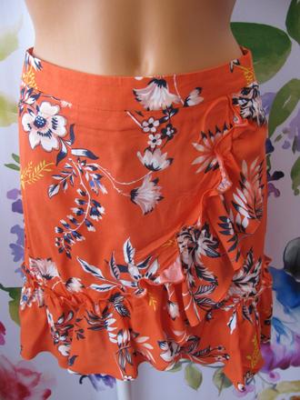 Oranžová letní mini sukně s květy a volánky, 36