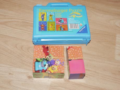 Maly kufrik s kostickami-puzzle-kosticky- na cesty,