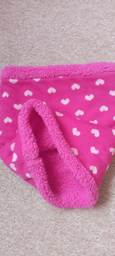 Tm růžový nákrčník, 