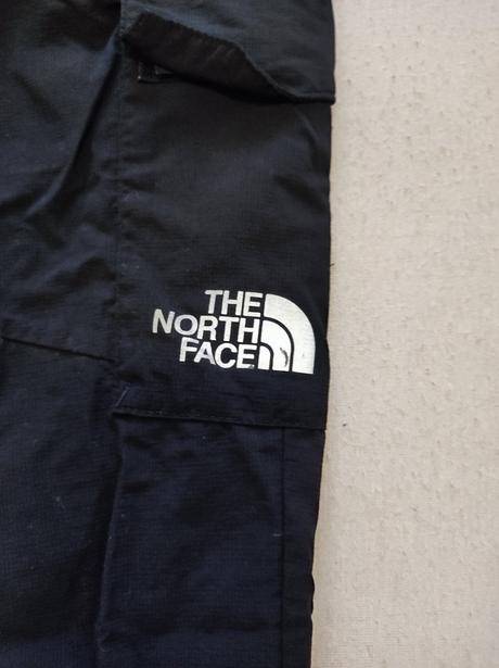 Šusťákové kalhoty the north face vel. 152-158, 152