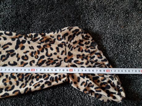 Fleesový overal značky decret, s