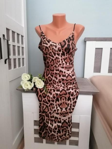 Tygrované šaty, 36