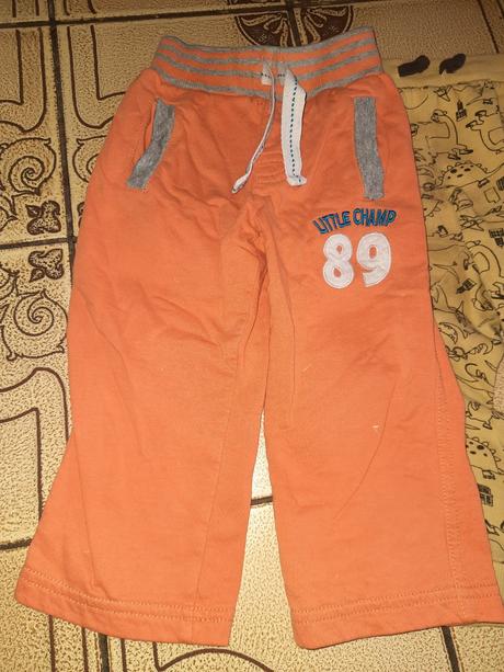 Klučičí tepláky dinosaur, auta, oranžové vel. 80, topomini,80