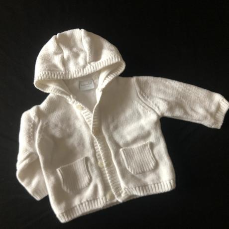 Bílý svetřík s podšívkou, 62