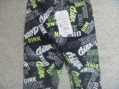 Nové černé 7/8 legíny s nápisy zn. kugo vel. 134, kugo,134