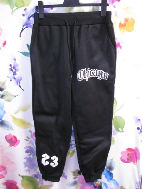 Pružné černé tepláky unisex, m