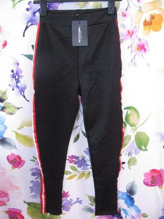 Černé elastické tepláky s légou, 36