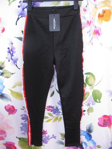 Černé elastické tepláky s légou, 36