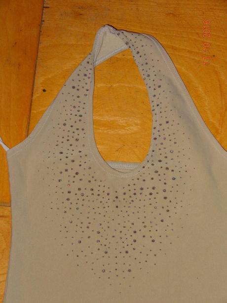 Dívčí tílko, 122