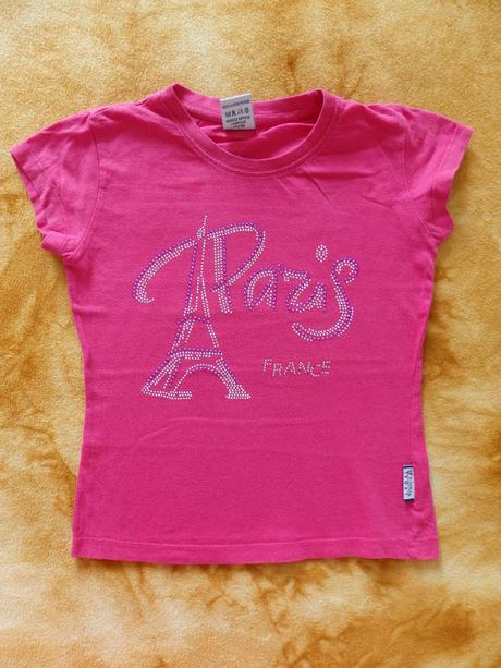 Tričko s eiffelovkou, 128