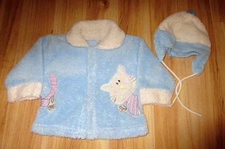 Chlupatý kabátek a čepice, 74