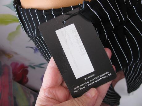 Černé elastické kalhoty s bílými pruhy, 40