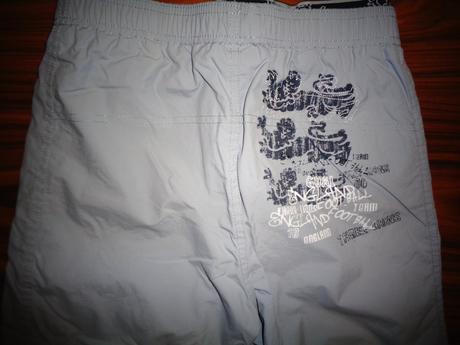 Luxusní šedé 3/4 šusťákové kalhoty 140/146, next,140