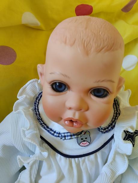 Značené porcelánové miminko,