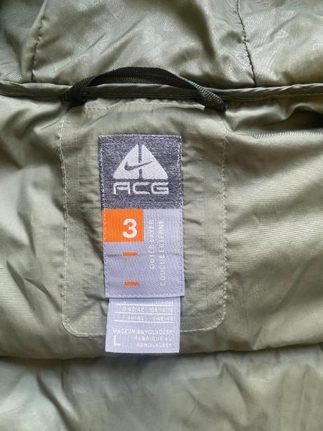 Krásná péřová bunda nike velikost 40/l, nike,40