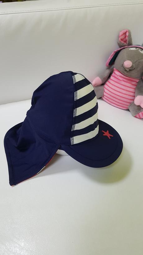 Koupaci cepice, next,86