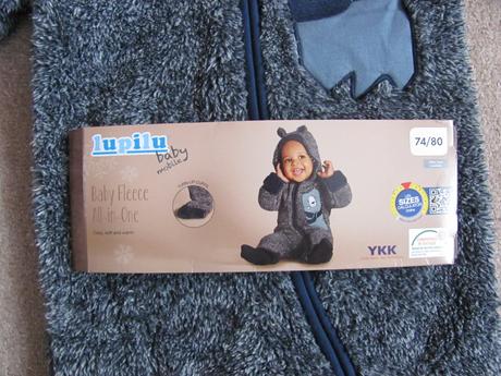 Šedý chlupatý overal, lupilu,74