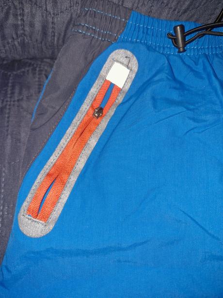 Zimní modré zateplené kalhoty zn. kugo vel. 116, kugo,116