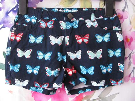 Krásné tmavě modré kraťasy s motýlkama john baner, 128