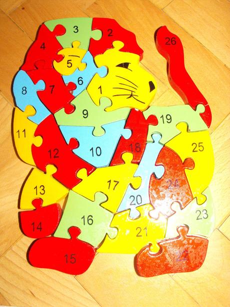 Dřevěný puzzle lev,