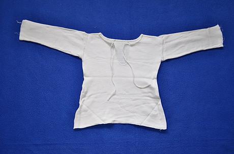 Kojenecká košilka, 56