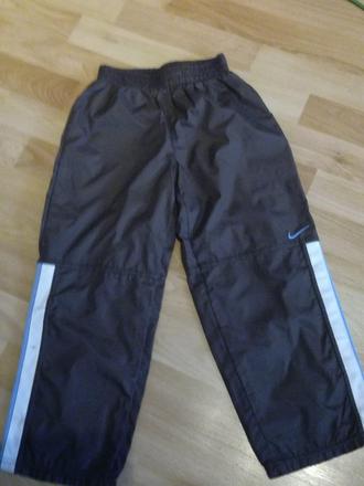 Šusťákové kalhoty , nike,116