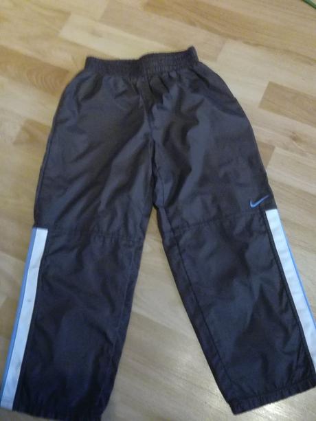 Šusťákové kalhoty , nike,116