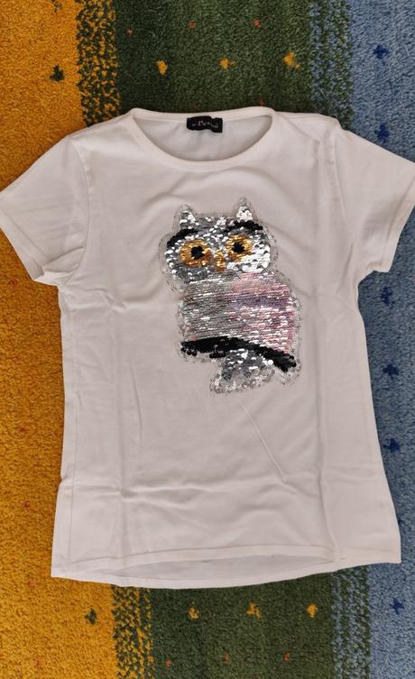 Bíle triko se sovou, 146