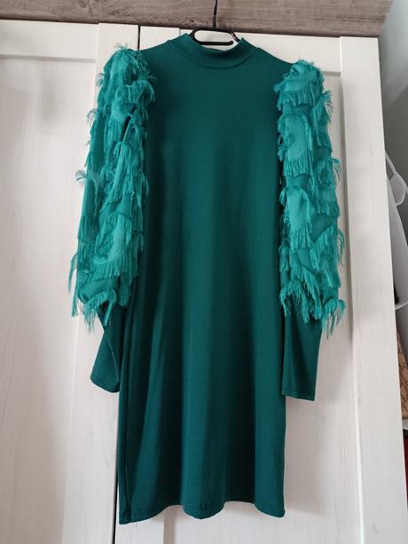 Tyrkysové šaty, 36