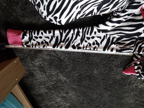 Fleesový overal značky next, next,m