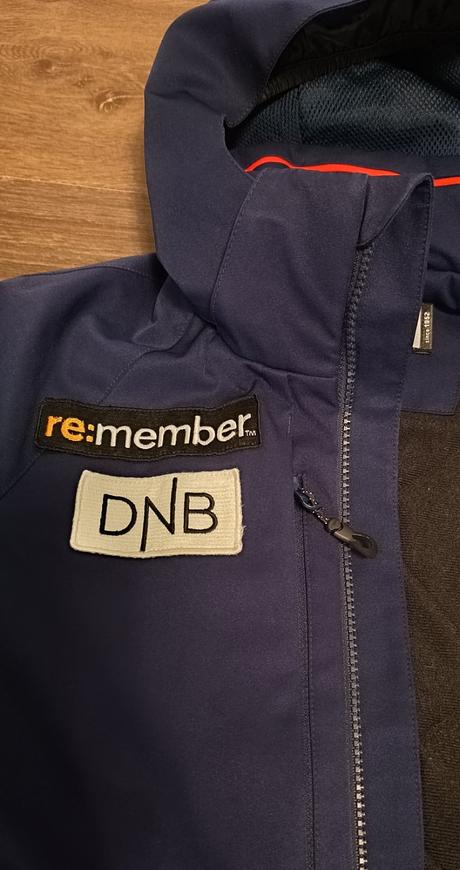 Lyžařská bunda phenix a nové kalhoty helly hansen, 152