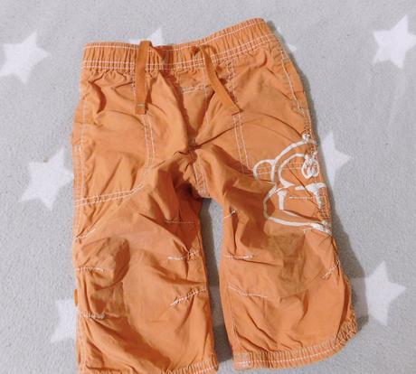 Podšité roll-up kalhoty s opičkou next vel.74, next,74