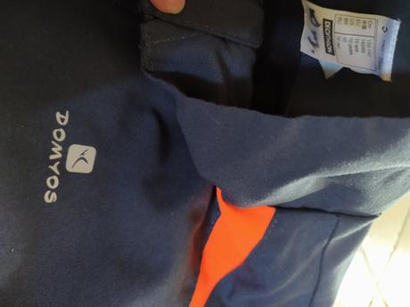 Šedo oranžová bunda, decathlon,134