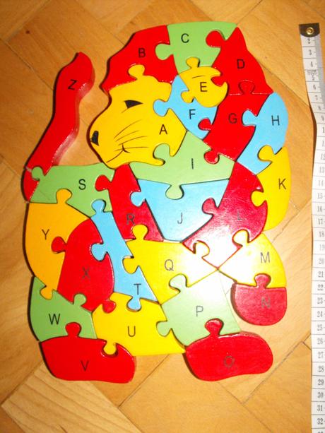 Dřevěný puzzle lev,